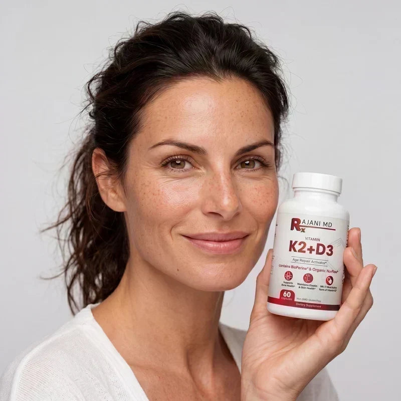 Model holding a bottle of Rajani MD Vitamin K2 + D3 Capsules.
