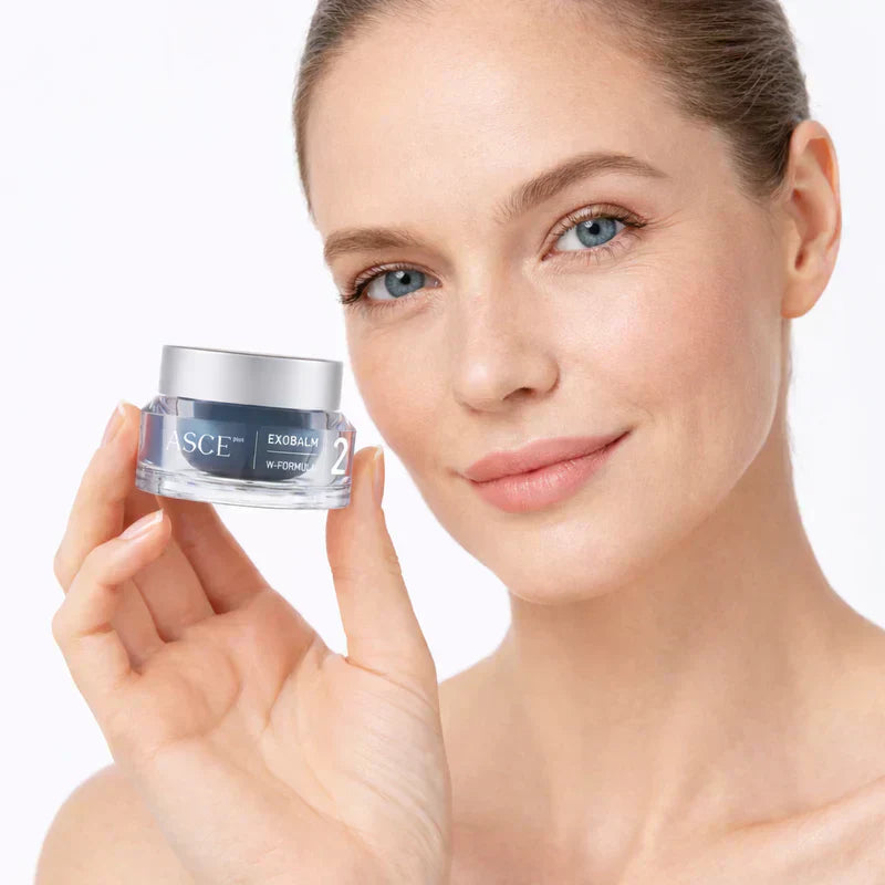 Woman holding ASCEplus ExoBalm, a Korean skincare balm formulated with rose stem cell exosomes for post-procedure skin support.