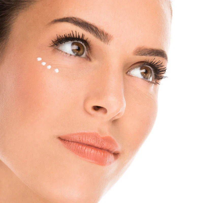 C+ Brightening Eye Complex by Rajani MD displayed with its cooling metal applicator for targeting dark circles, puffiness, and under-eye brightness.