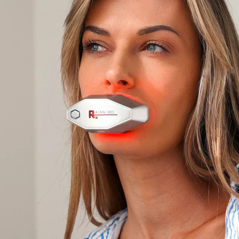 Woman wearing the Rajani MD PlasmaGLO™ LED Lip and Mouth Device to help improve the appearance of vertical lip lines.