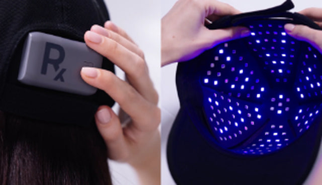 PlasmaGLO™ Hair+ Cap with its blue light mode illuminated; the mode uses 60 blue LEDs at 422 nm.