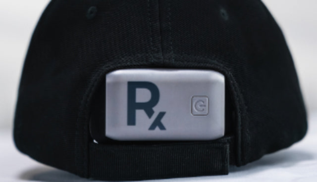 Close-up of the controller used to operate the Rajani MD PlasmaGLO™ Hair+ Cap’s light therapy modes.