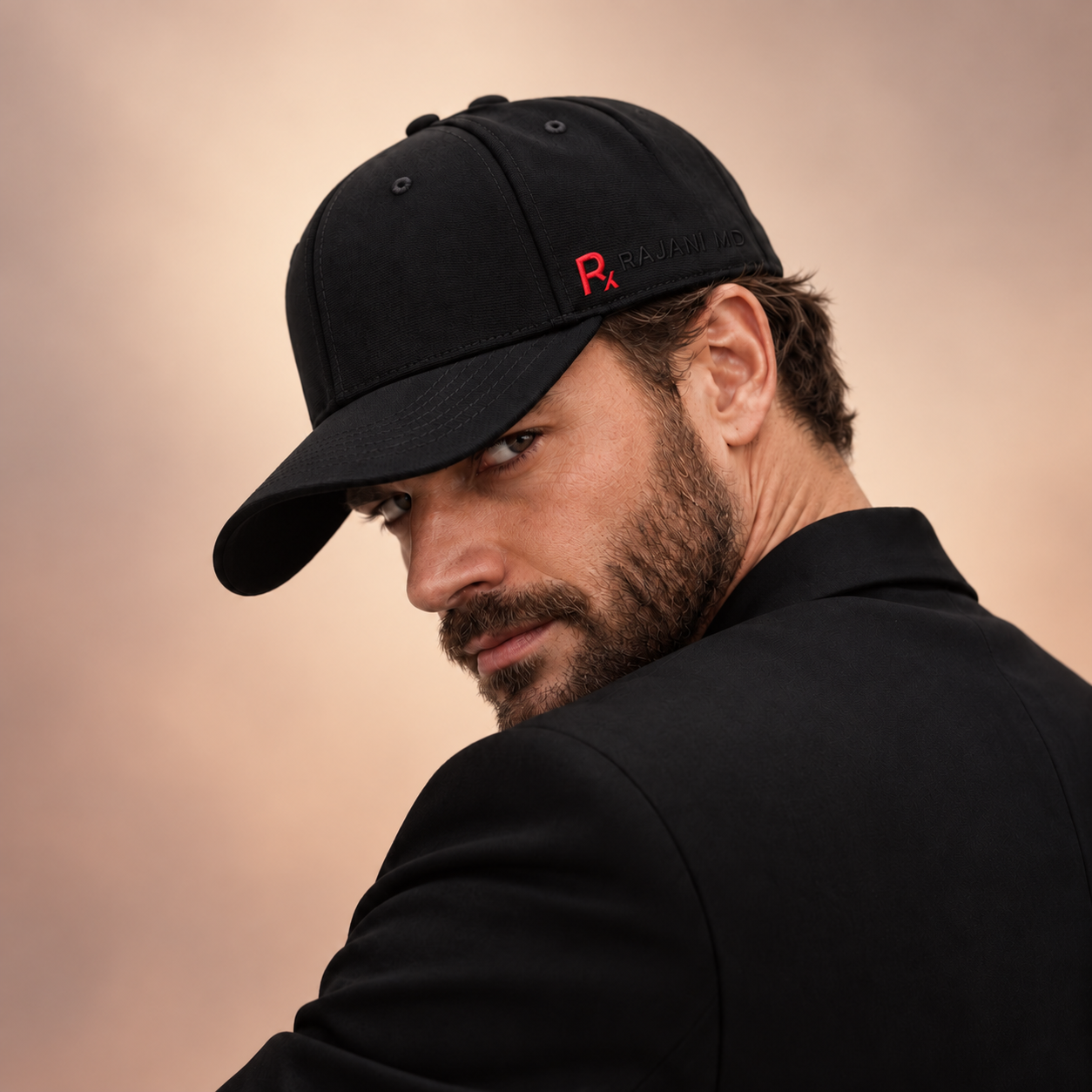 plus-cap-man-model.png	Man modeling the Rajani MD PlasmaGLO™ Hair+ Cap, a cordless red light and laser device for hair growth support.