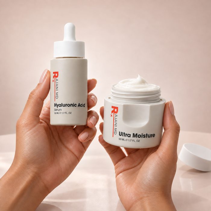 Hands holding Hyaluronic Acid Serum and an open jar of Ultra Moisture