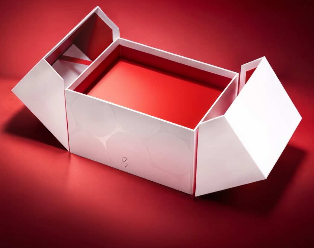 An open white gift box on a red background